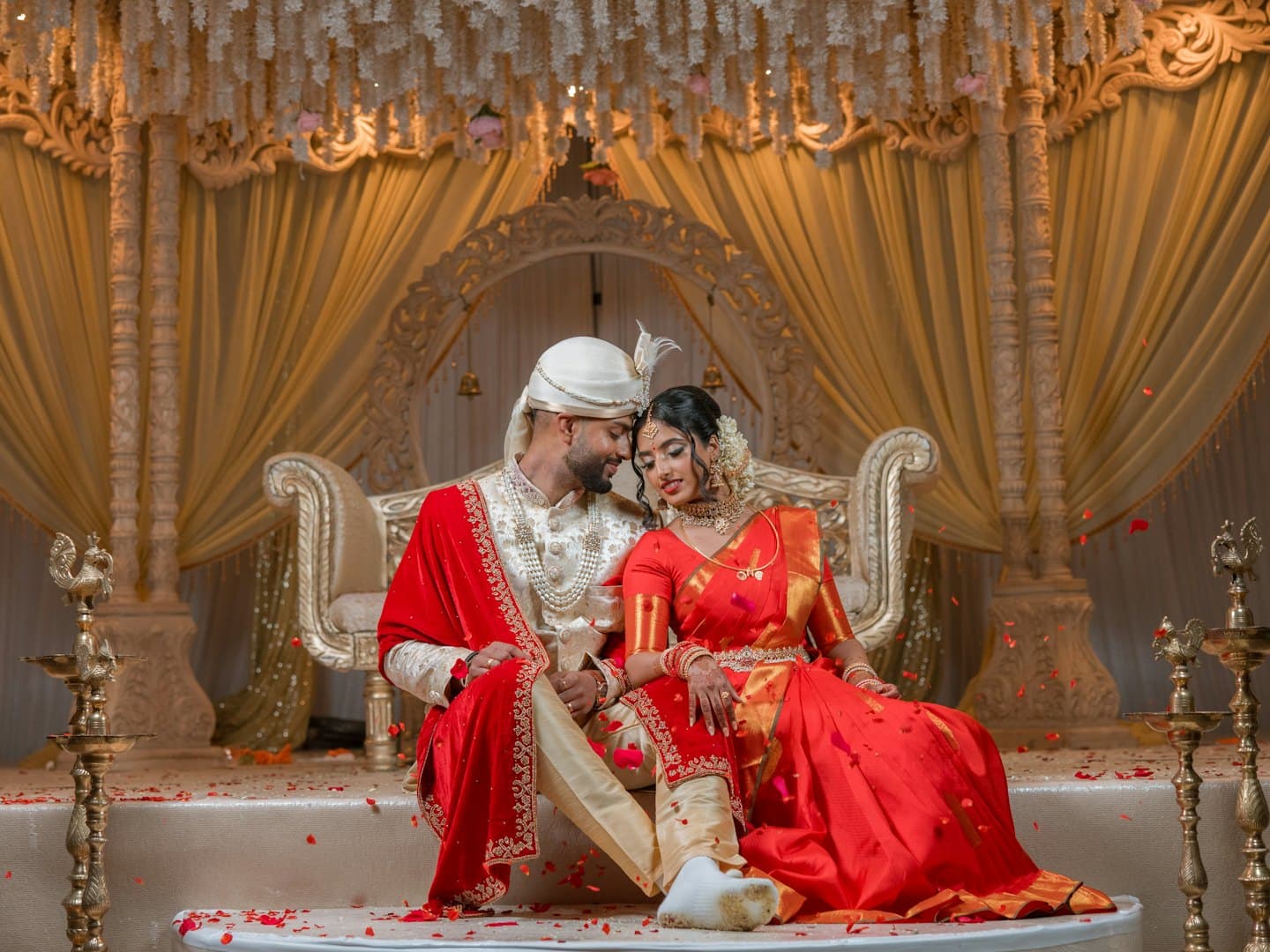 A bride and groom smiling at their wedding