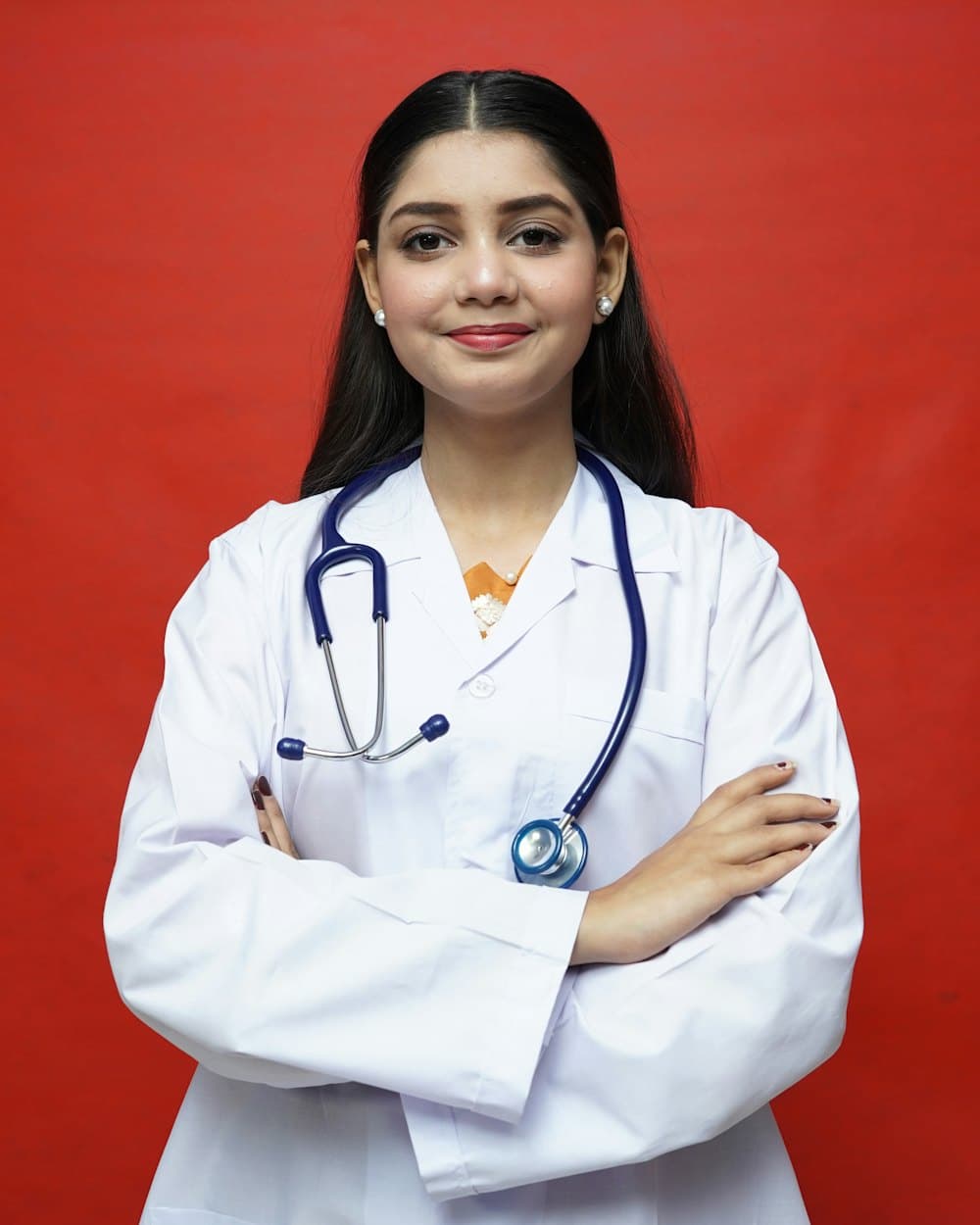 A smiling doctor with a stethoscope