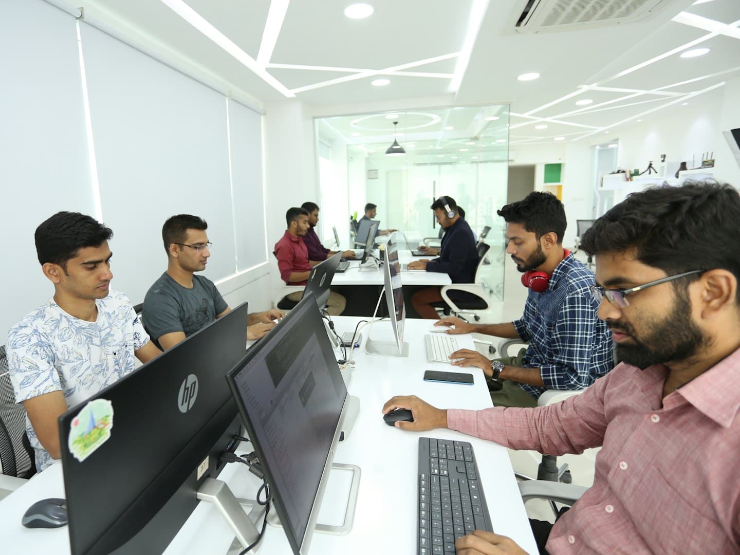 Software developers working at their desks