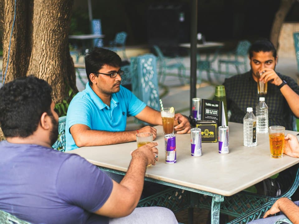 Friends sharing a meal at a restaurant table
